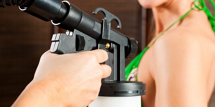 How to Make Sure Your Spray Tan Doesn't Turn You Orange or Streaky